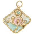 Gold pendant with a pink flower design on a white background